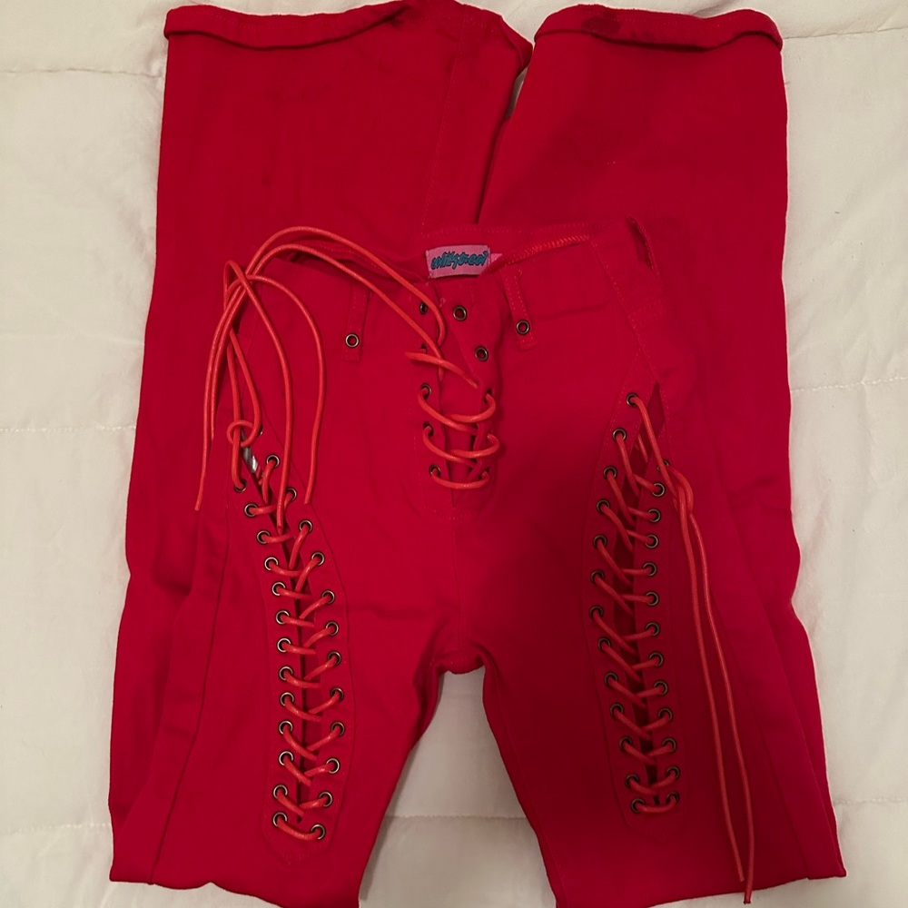 Red lace-up jeans